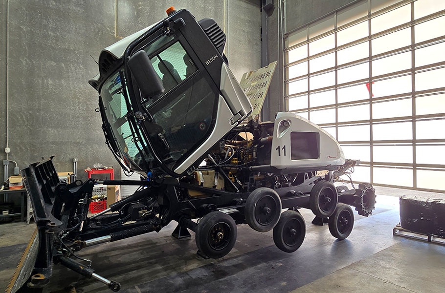 Rebuilding snow groomers used for ice roads and other roads built in wooded areas.
