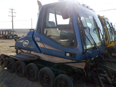 Older Bombardier model snow groomer sold by Rocky Mountain Snow Cats.